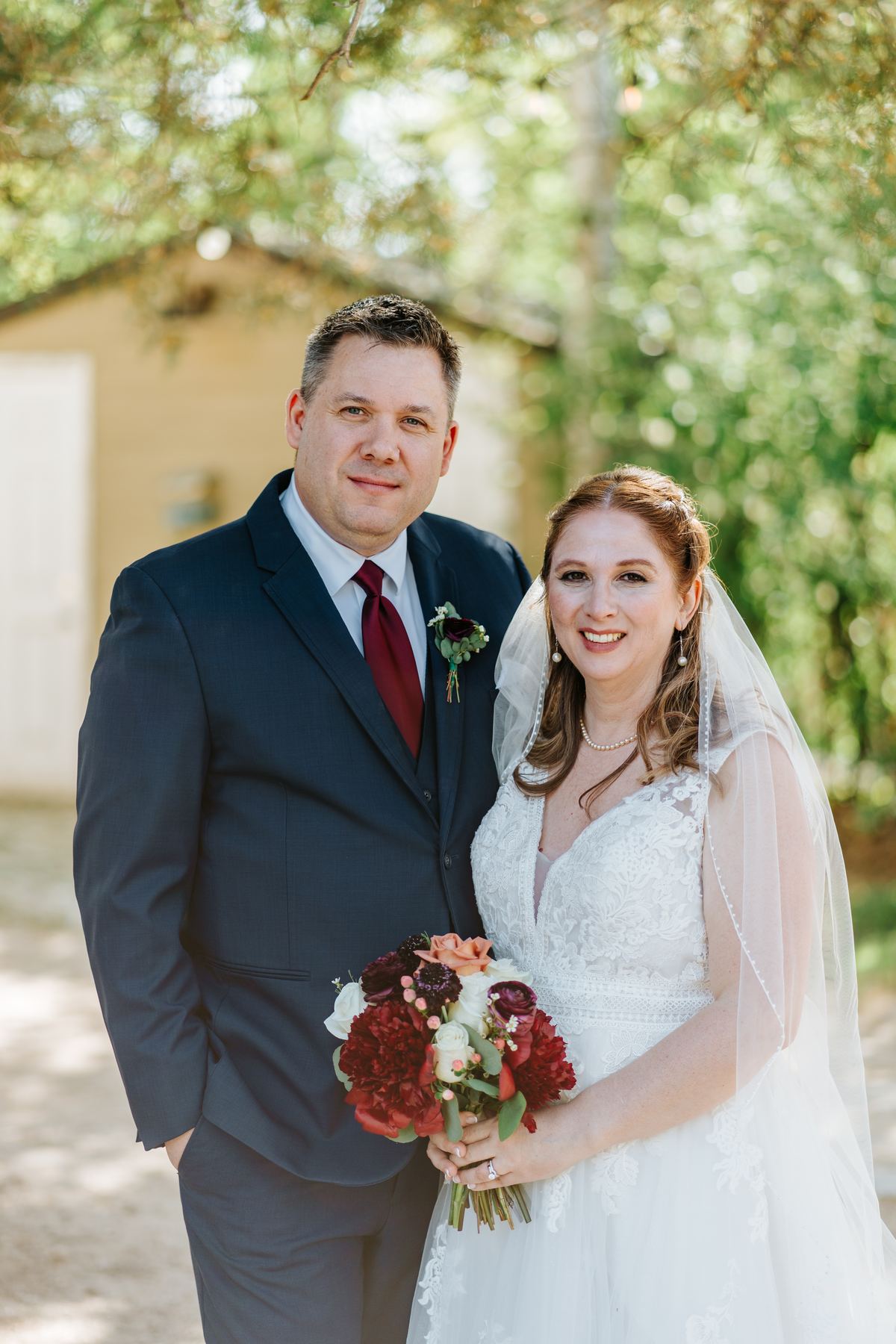 Couple portrait under the established tree canopy at Pineridge Hollow, Winnipeg, Manitoba — Ngo Photography