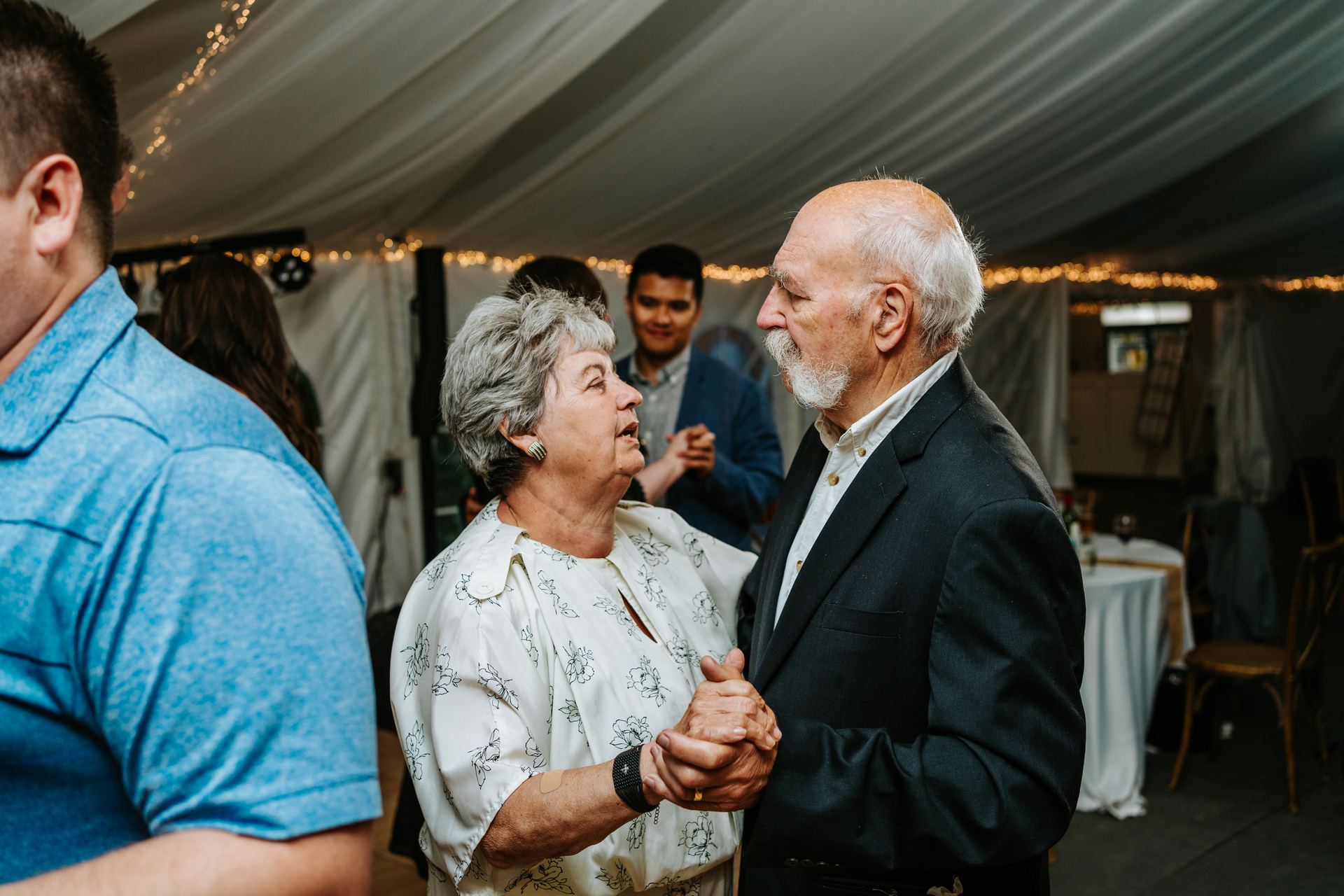 Flower girl candid moment at the Pineridge Hollow reception — Tara and Carter's wedding, Manitoba