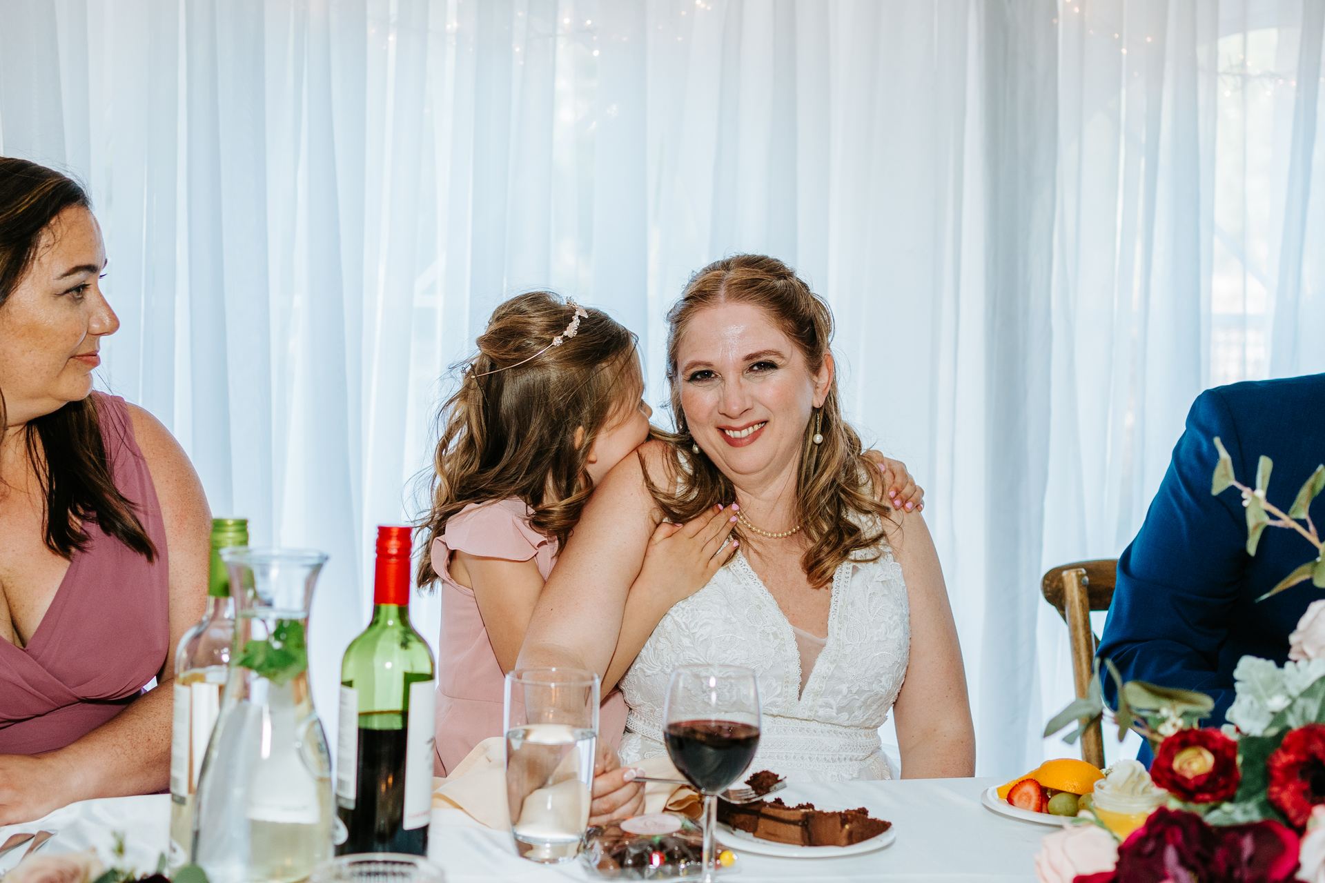 Reception tablescape with burgundy and blush florals and cross-back chairs at Pineridge Hollow, Manitoba — Ngo Photography