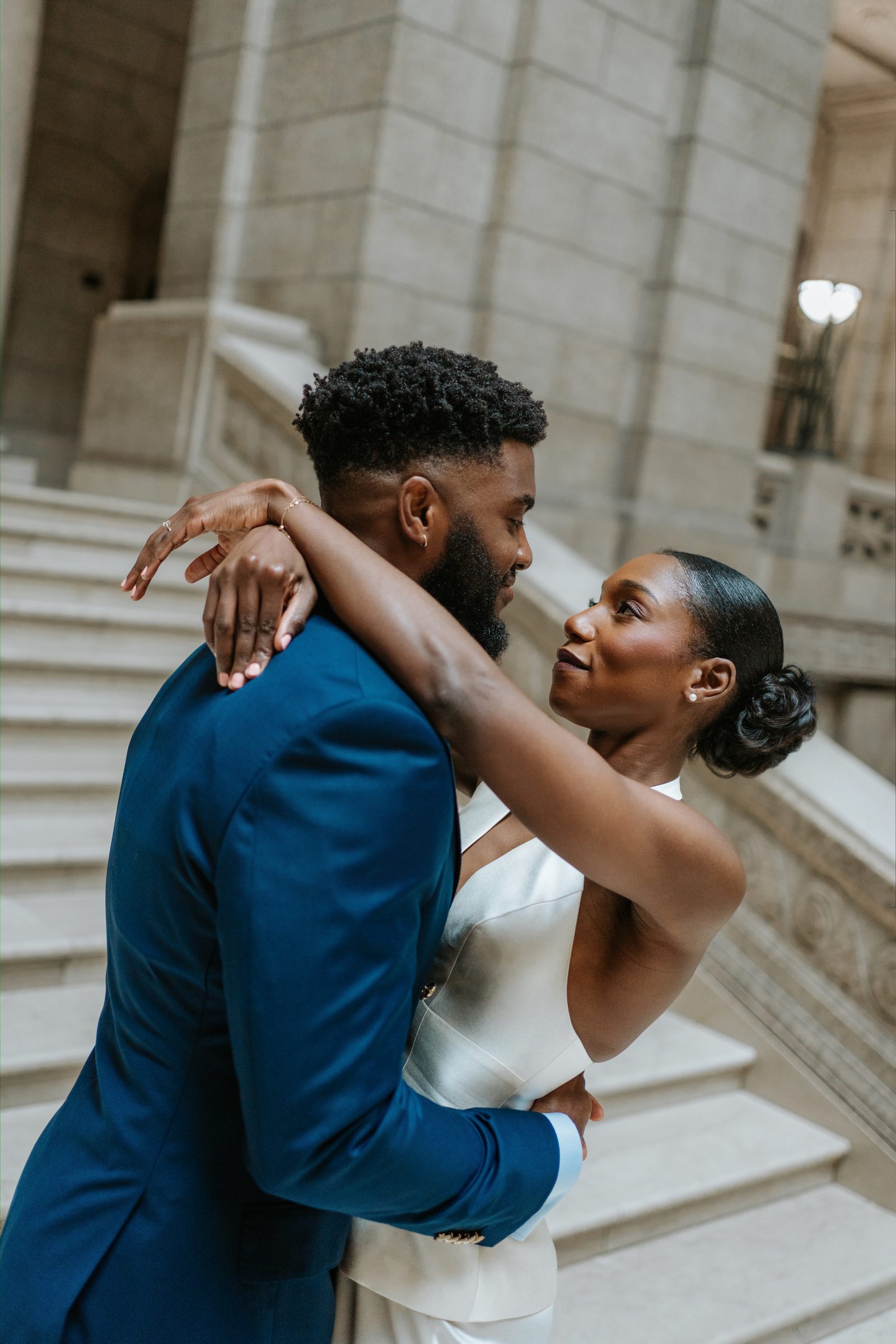 Close detail of the ornate carved stone exterior facade of the Manitoba Legislative Building — architectural detail, Winnipeg wedding photography by Ngo Photography