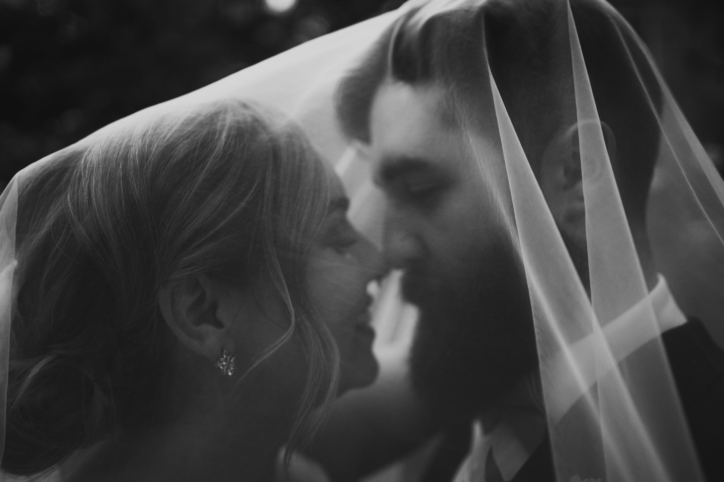 Close up bride and groom under veil — fine art wedding photography Manitoba