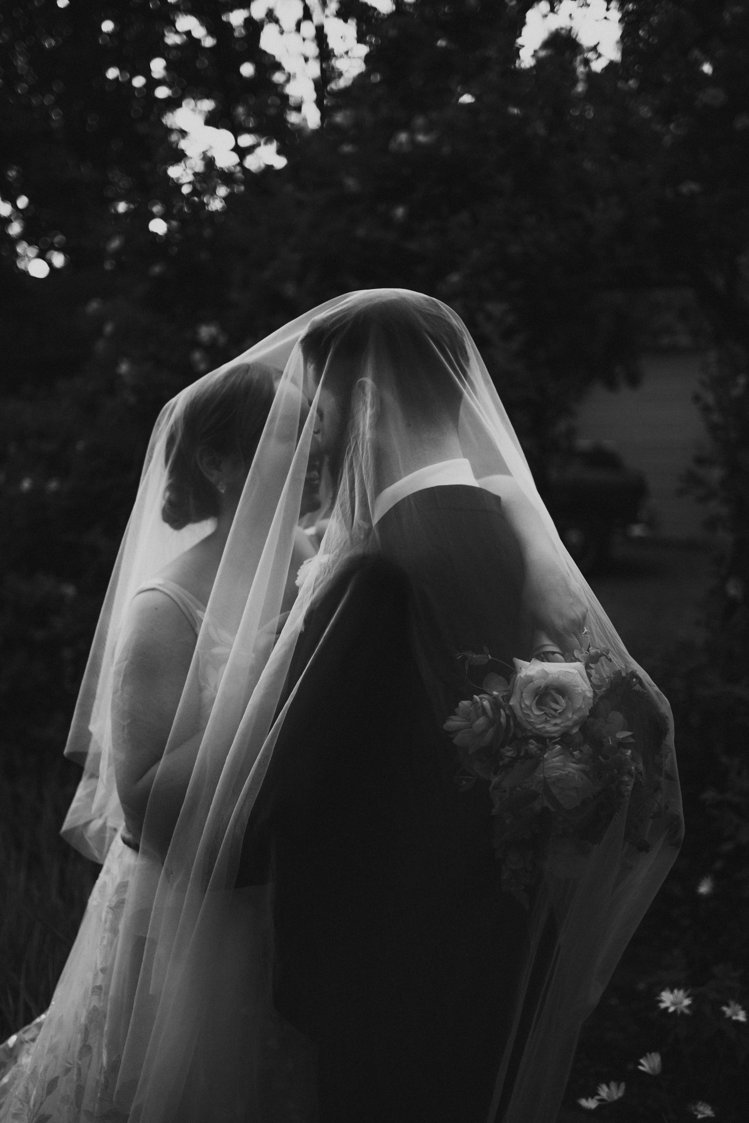 Couple under veil