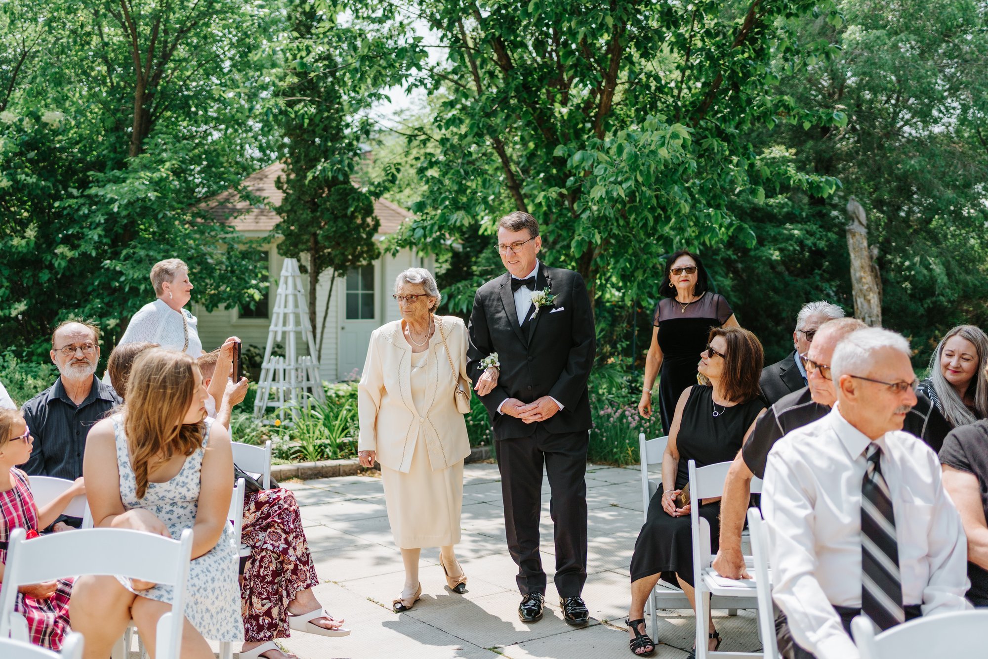 Ceremony moment at The Gates on Roblin wedding Headingley Manitoba — Ngo Photography