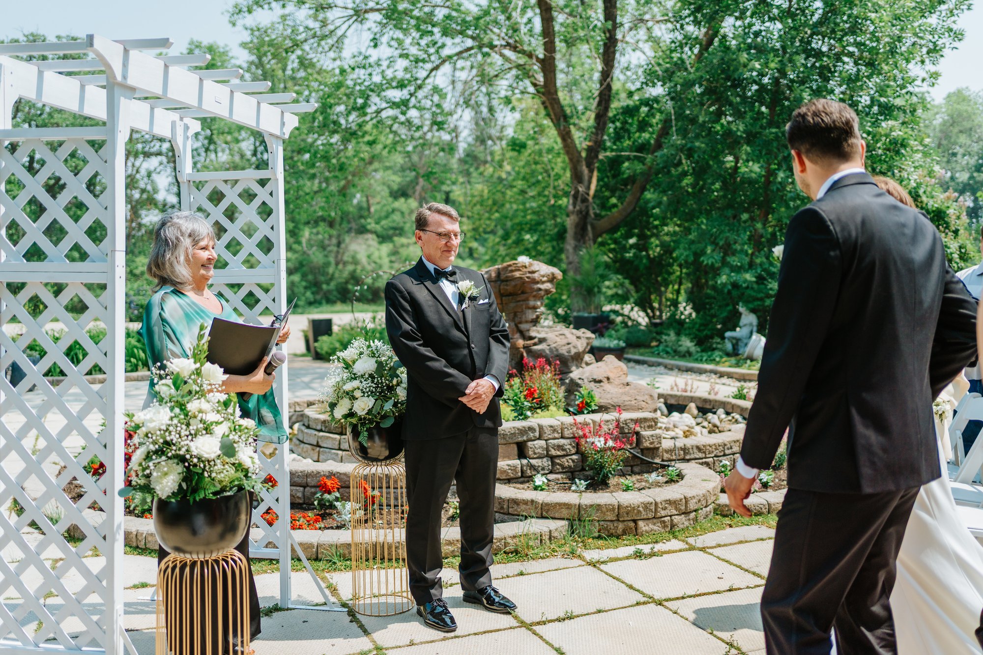 Ceremony moment at The Gates on Roblin wedding — photography by Ngo Photography