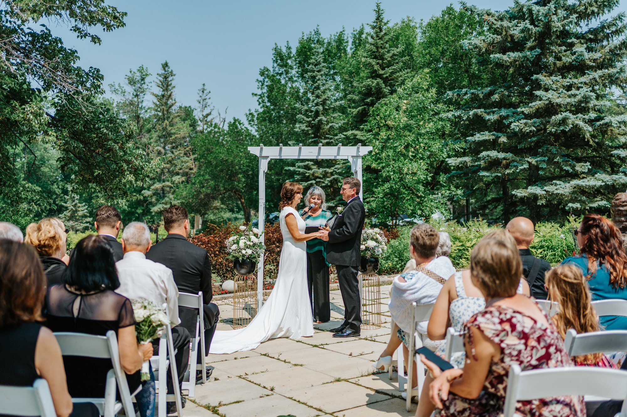 Wedding ceremony at The Gates on Roblin Headingley Manitoba — Ngo Photography