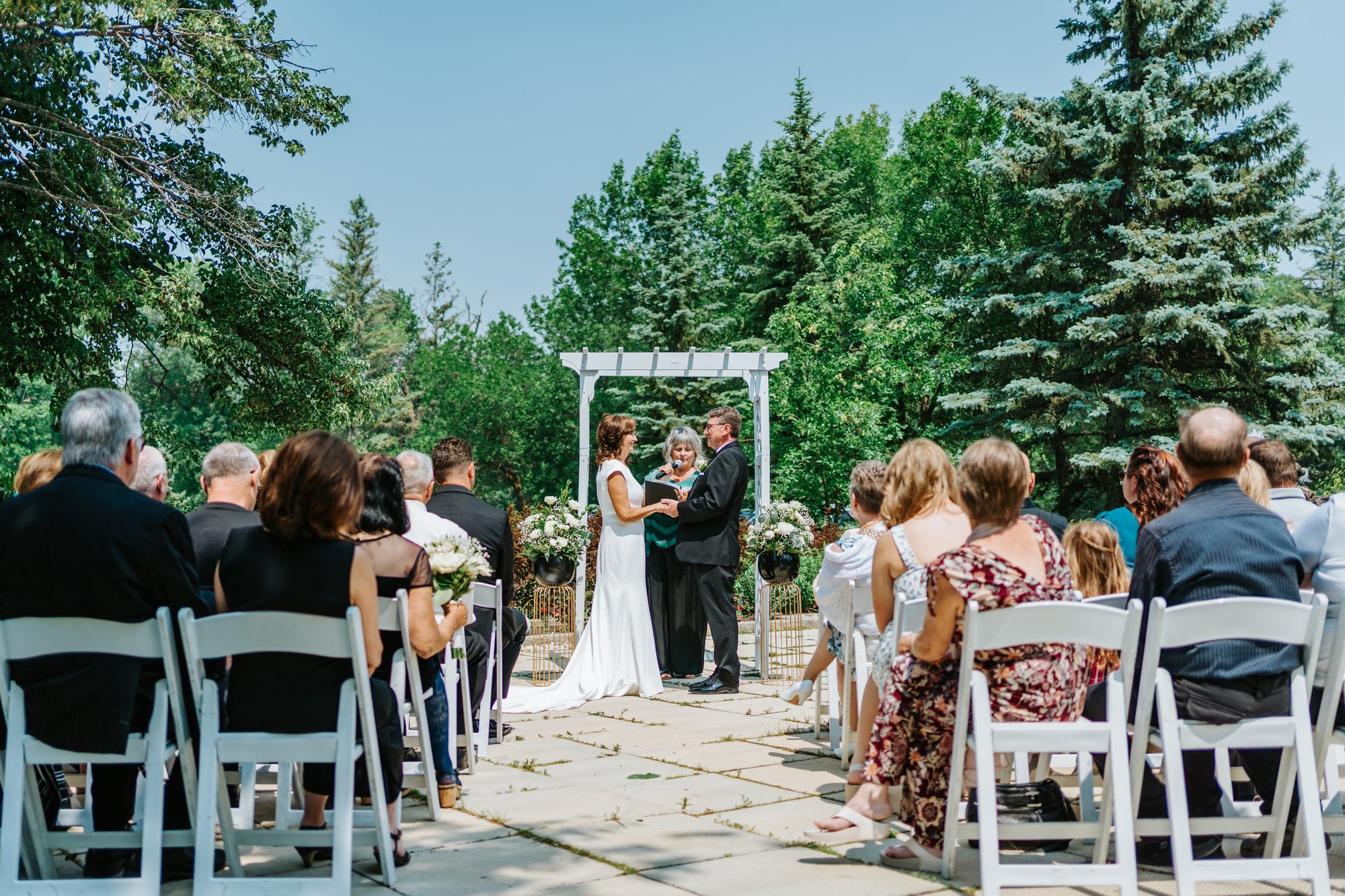 Intimate ceremony moment at The Gates on Roblin — wedding photography by Ngo Photography