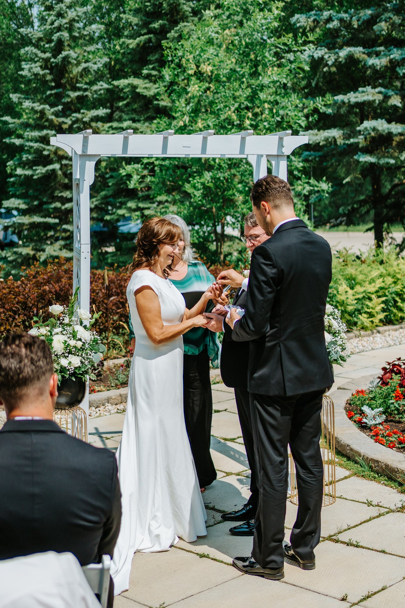 Ceremony moment at The Gates on Roblin wedding — photography by Chris Ngo Winnipeg