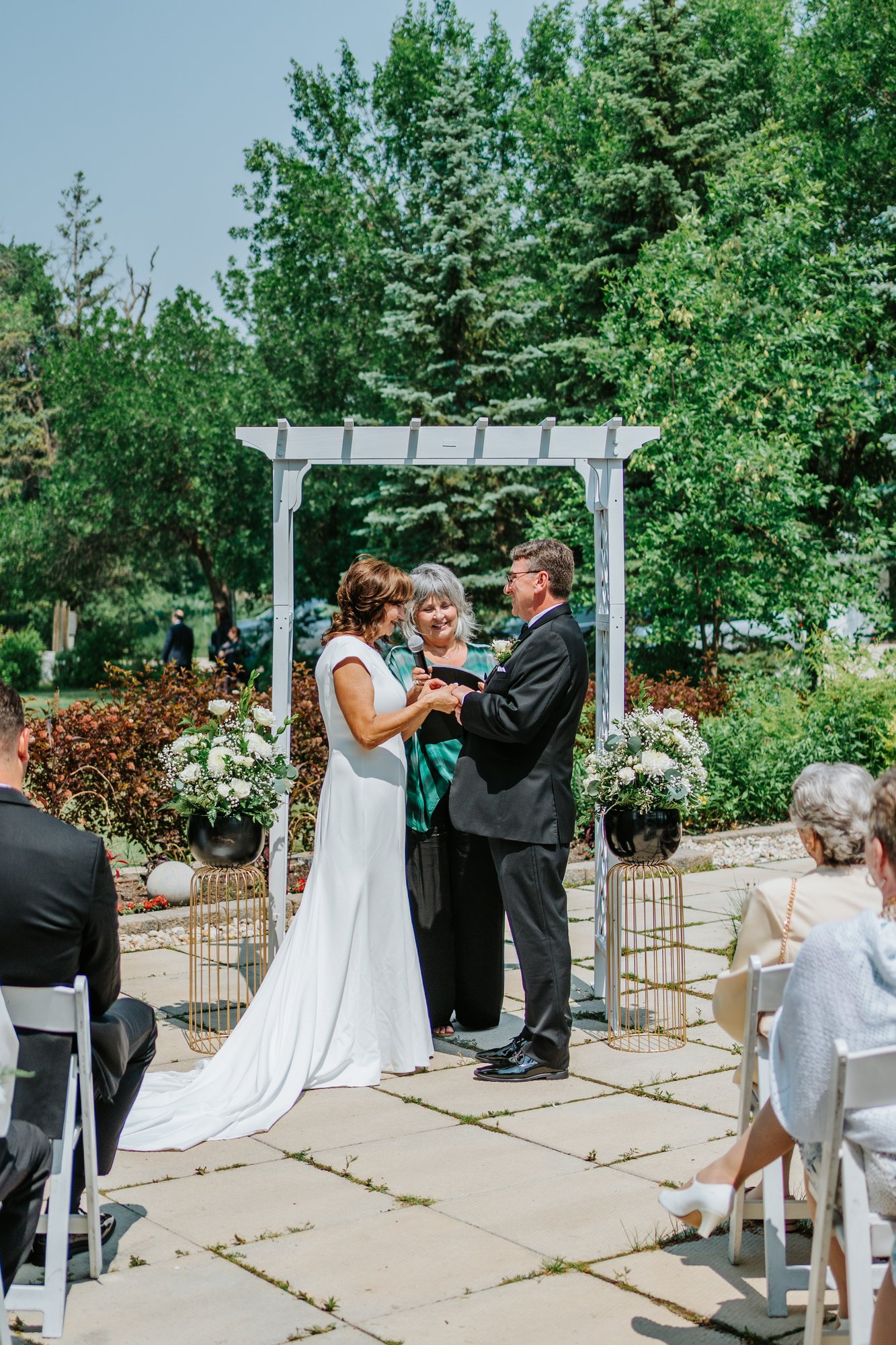 Wedding ceremony at The Gates on Roblin Manitoba — photography by Ngo Photography