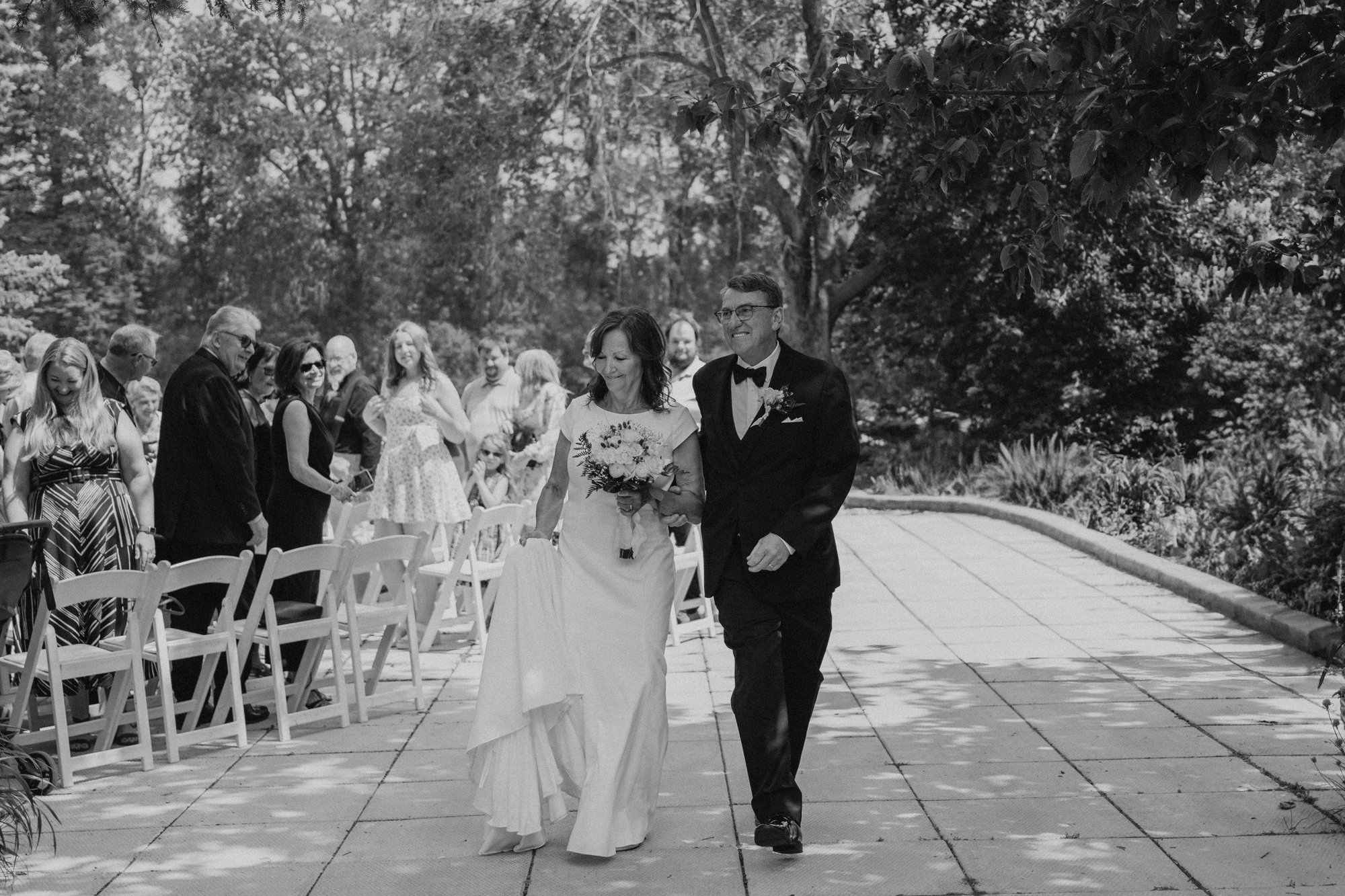 Ceremony at The Gates on Roblin Headingley Manitoba — wedding photography by Chris Ngo