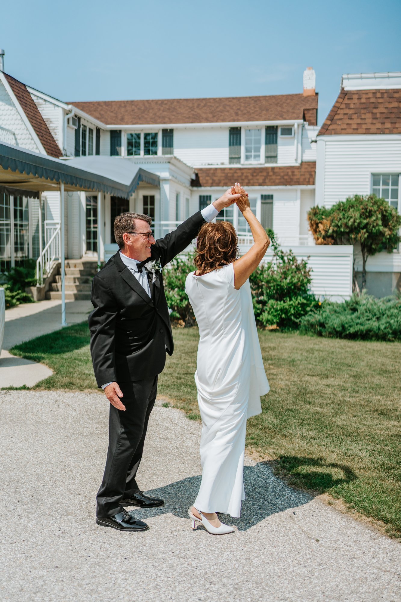 Couple portrait on the Assiniboine River grounds at The Gates on Roblin Headingley Manitoba — Ngo Photography